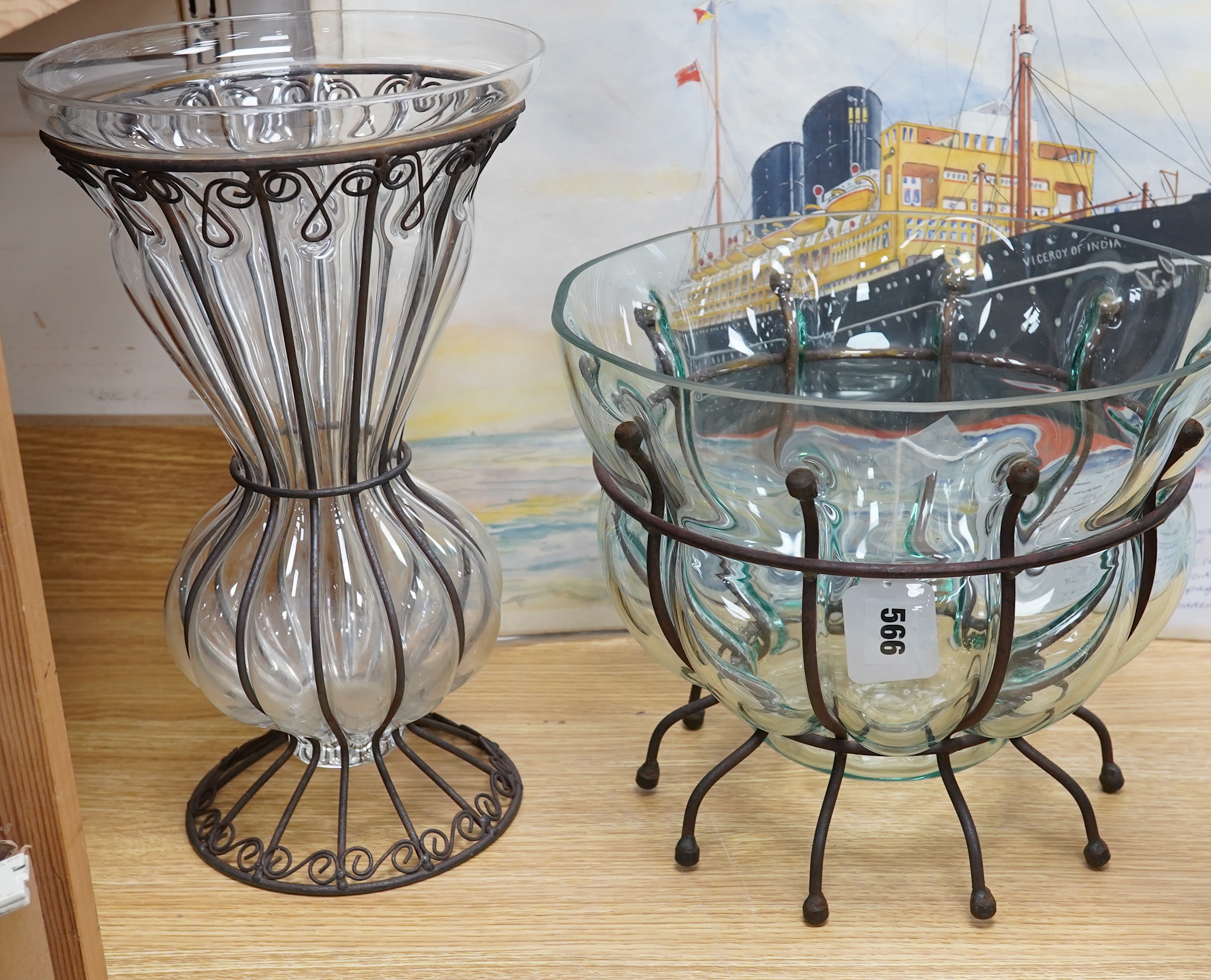 A glass vase and a similar bowl with wrought iron stand, vase 38cm high. Condition - good